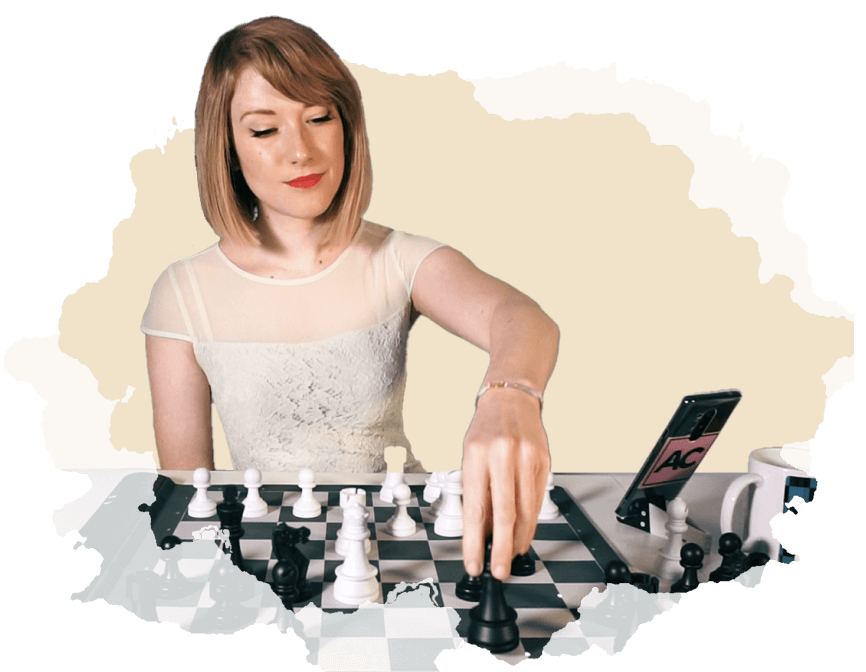 Man playing chess against computer Stock Photo